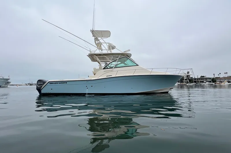 Be Chumming Yacht Photos Pics 2018 Grady-White Express 370 boat on calm water, side view.