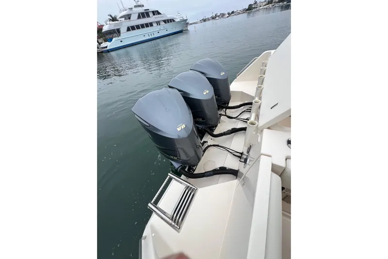 Be Chumming Yacht Photos Pics 2018 Grady-White Express 370 with triple V8 engines docked in marina.