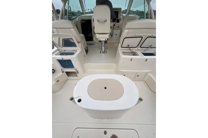 Be Chumming Yacht Photos Pics 2018 Grady-White Express 370 boat interior with seating and storage compartments.