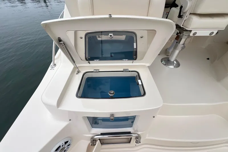 Be Chumming Yacht Photos Pics 2018 Grady-White Express 370 boat with open storage compartments on deck.