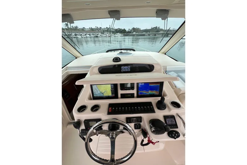 Be Chumming Yacht Photos Pics Helm of 2018 Grady-White Express 370 with advanced navigation and control systems.