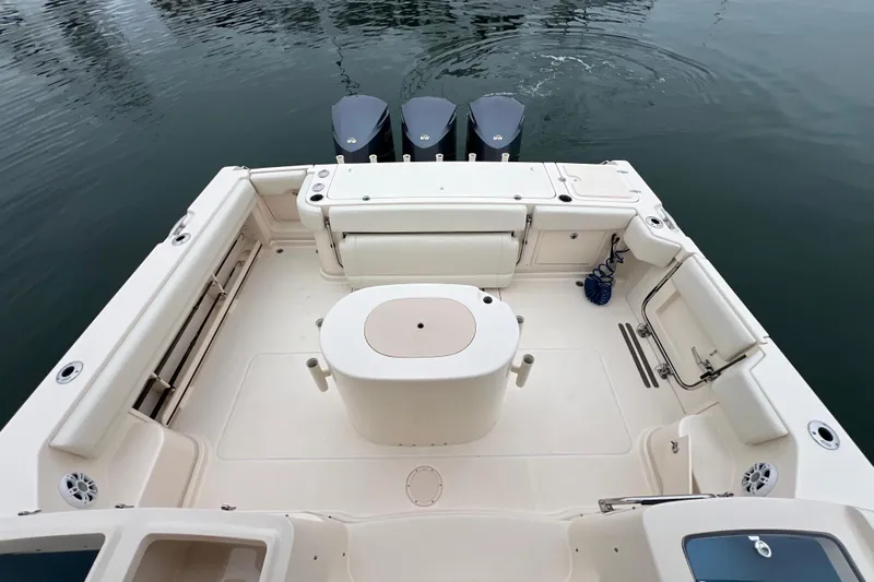 Be Chumming Yacht Photos Pics 2018 Grady-White Express 370 boat deck with triple outboard motors.