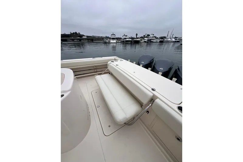 Be Chumming Yacht Photos Pics 2018 Grady-White Express 370 boat interior with seating and outboard motors.