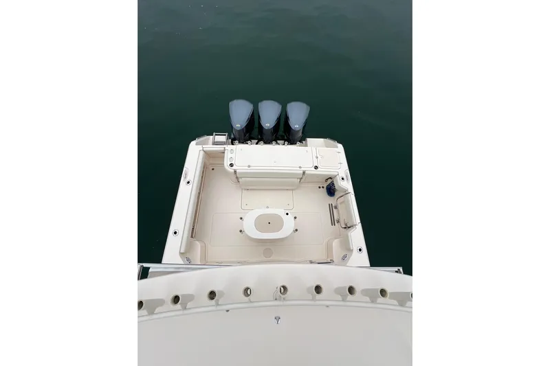Be Chumming Yacht Photos Pics 2018 Grady-White Express 370 boat with triple outboard motors, viewed from above.