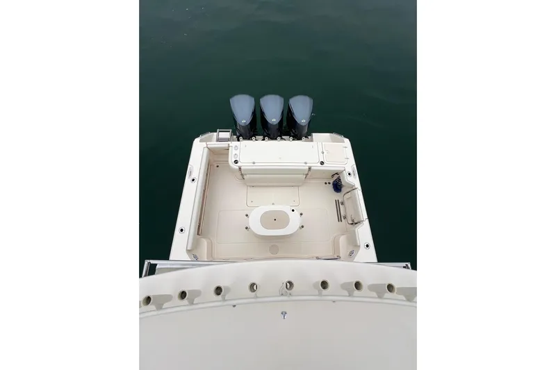 Be Chumming Yacht Photos Pics 2018 Grady-White Express 370 boat deck with triple outboard motors.