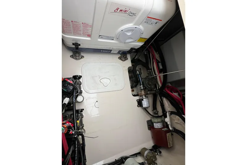 Be Chumming Yacht Photos Pics Engine compartment of 2018 Grady-White Express 370 boat, showcasing mechanical components.