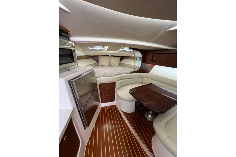 Be Chumming Yacht Photos Pics Luxurious interior of 2018 Grady-White Express 370 boat with cozy seating and modern amenities.