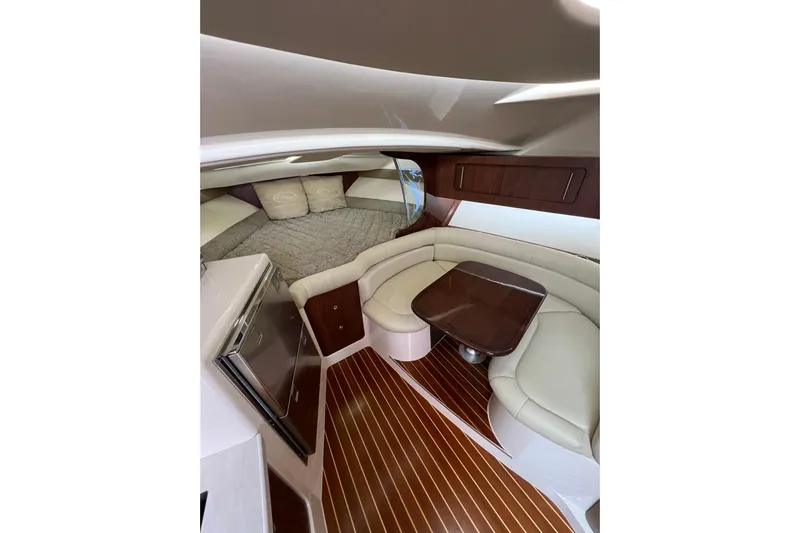 Be Chumming Yacht Photos Pics Interior of 2018 Grady-White Express 370, featuring elegant seating and wood flooring.