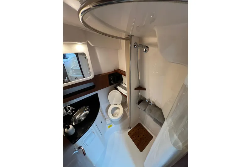 Be Chumming Yacht Photos Pics 2018 Grady-White Express 370 bathroom with shower, sink, and toilet.