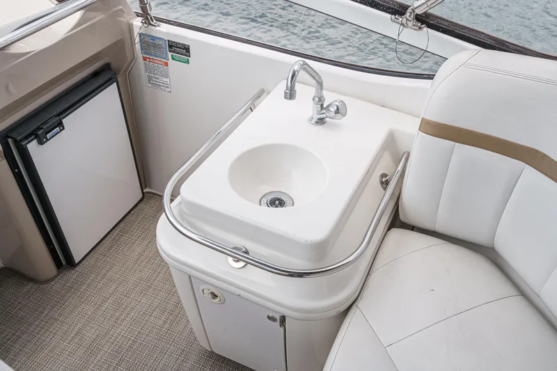  Yacht Photos Pics 2005 Carver 41 Cockpit Motor Yacht interior with sink and mini fridge.