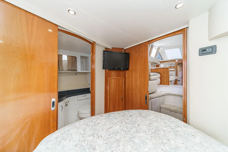  Yacht Photos Pics Interior of 2005 Carver 41 Cockpit Motor Yacht with wood paneling and modern amenities.