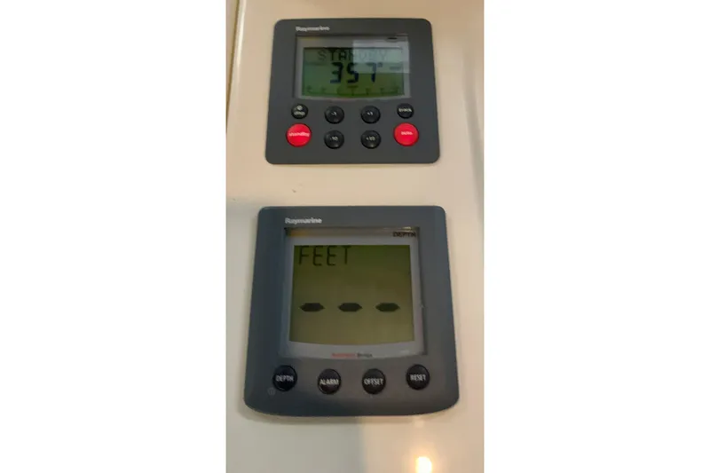 Lionheart Yacht Photos Pics Raymarine displays on 2006 Sabre 38 Hard Top Express boat dashboard.