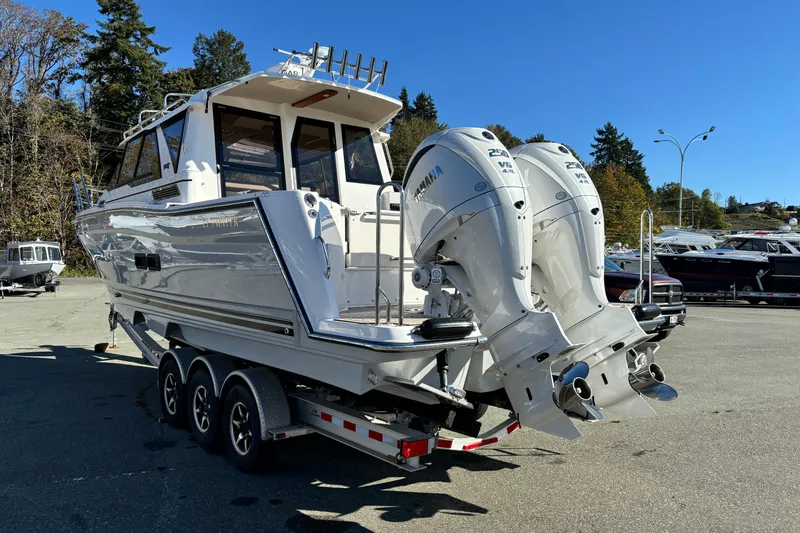  Yacht Photos Pics 2026 Cutwater C-288 Coupe boat with dual Yamaha outboard engines on a trailer.
