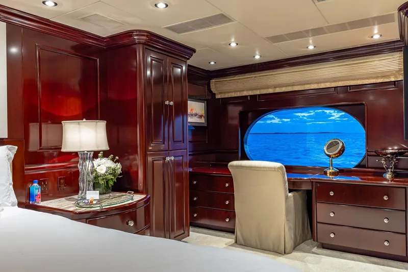 Lady Joy Yacht Photos Pics Luxurious 2007 Christensen Tri-Deck yacht interior with elegant wood finish and ocean view.
