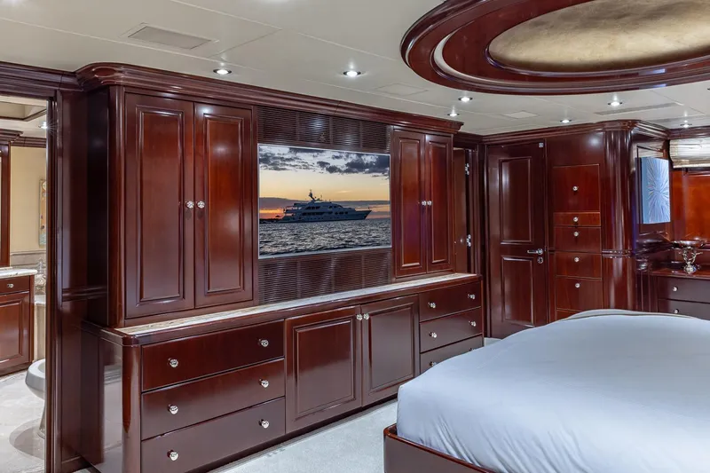 Lady Joy Yacht Photos Pics Luxurious 2007 Christensen Tri-Deck yacht interior with elegant wood cabinetry and modern decor.