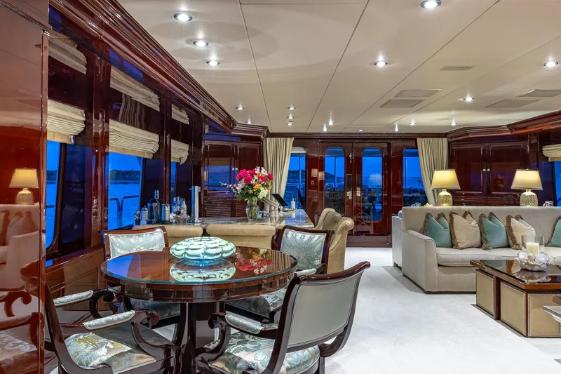 Lady Joy Yacht Photos Pics Luxurious interior of 2007 Christensen Tri-Deck yacht with elegant furnishings and ambient lighting.