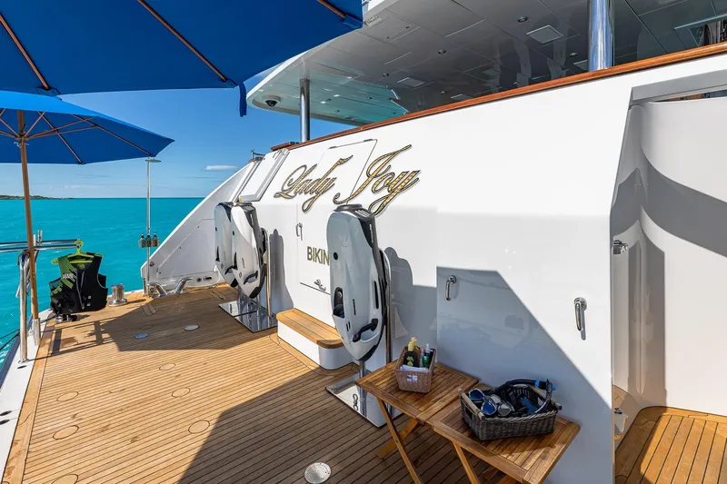 Lady Joy Yacht Photos Pics Luxurious 2007 Christensen Tri-Deck yacht deck with ocean view and diving gear.