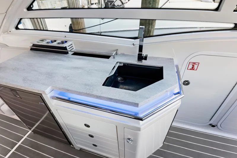 Well Told Yacht Photos Pics Interior of 2019 Formula 430 CROSSOVER featuring modern kitchenette.