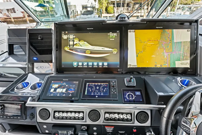 Well Told Yacht Photos Pics 2019 Formula 430 CROSSOVER cockpit with advanced navigation systems.