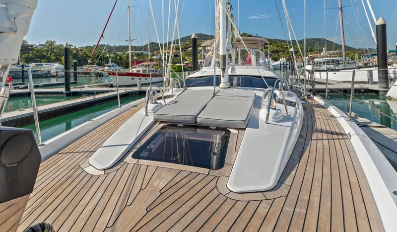 Margot Yacht Photos Pics Luxurious 2013 Oyster 575 yacht with teak deck in a marina setting.