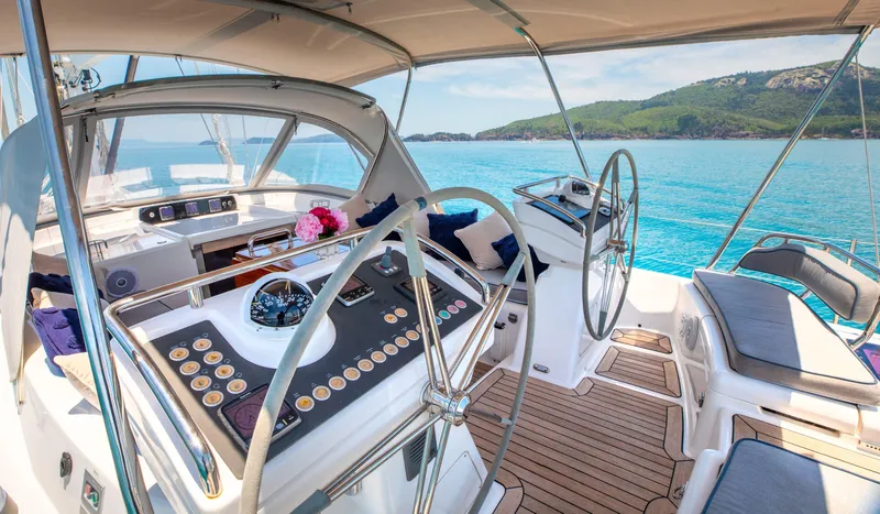 Margot Yacht Photos Pics Luxurious 2013 Oyster 575 yacht cockpit with dual steering wheels and scenic ocean view.