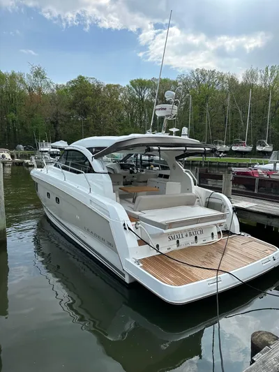 Small Batch Yacht Photos Pics 2016 Jeanneau Leader 36 yacht docked at a marina.