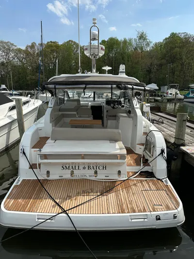 Small Batch Yacht Photos Pics 2016 Jeanneau Leader 36 yacht docked at marina, rear view.