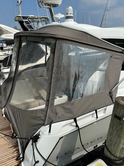 Small Batch Yacht Photos Pics 2016 Jeanneau Leader 36 with cockpit enclosure at marina.