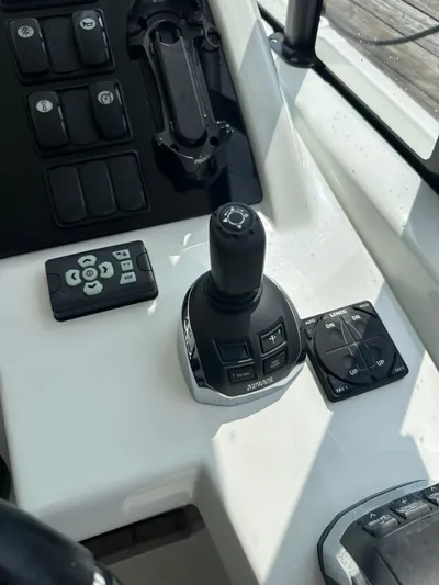 Small Batch Yacht Photos Pics Joystick control panel of a 2016 Jeanneau Leader 36 boat.