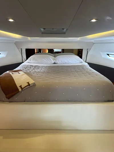 Small Batch Yacht Photos Pics Luxurious bedroom interior of 2016 Jeanneau Leader 36 yacht with cozy bedding.