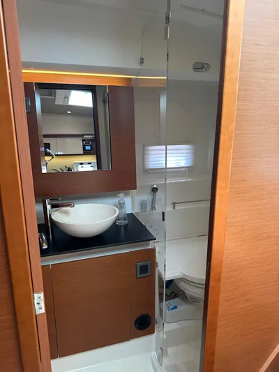 Small Batch Yacht Photos Pics 2016 Jeanneau Leader 36 bathroom with modern sink and mirror