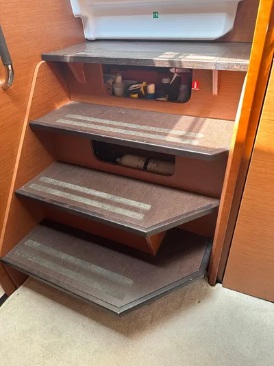 Small Batch Yacht Photos Pics Staircase inside 2016 Jeanneau Leader 36 boat with storage compartments.