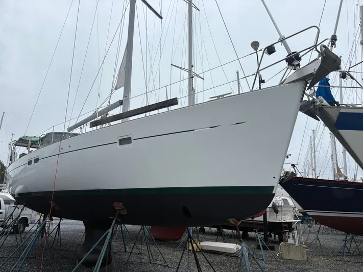 At Last Yacht Photos Pics 2004 Beneteau Oceanis 473 sailboat on stands in a boatyard.