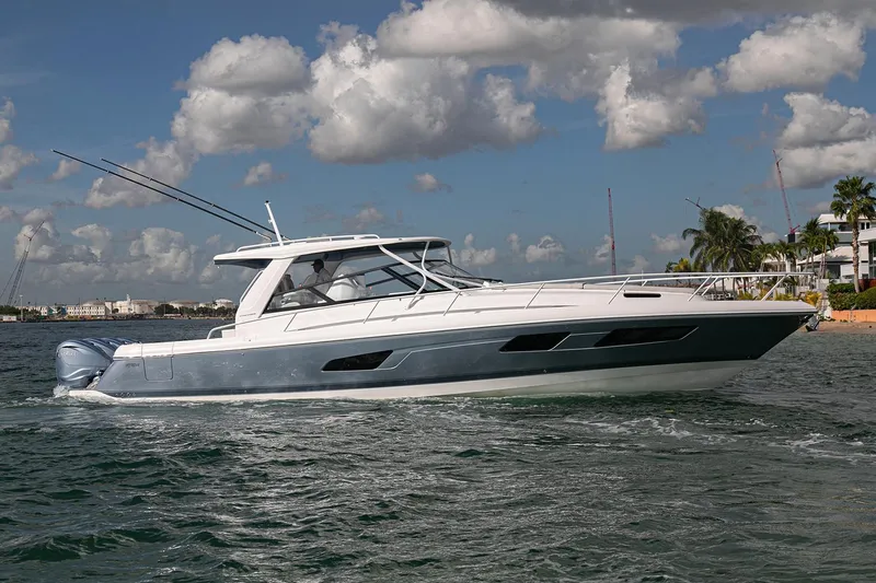 R&r 5 Yacht Photos Pics Manufacturer Provided Image: 2022 Intrepid 477 Evolution luxury yacht cruising on a sunny day.