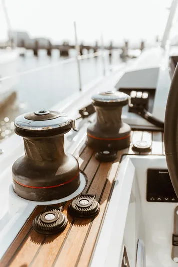  Yacht Photos Pics 2024 Beneteau Oceanis 46.1 yacht deck with winches and teak finish.