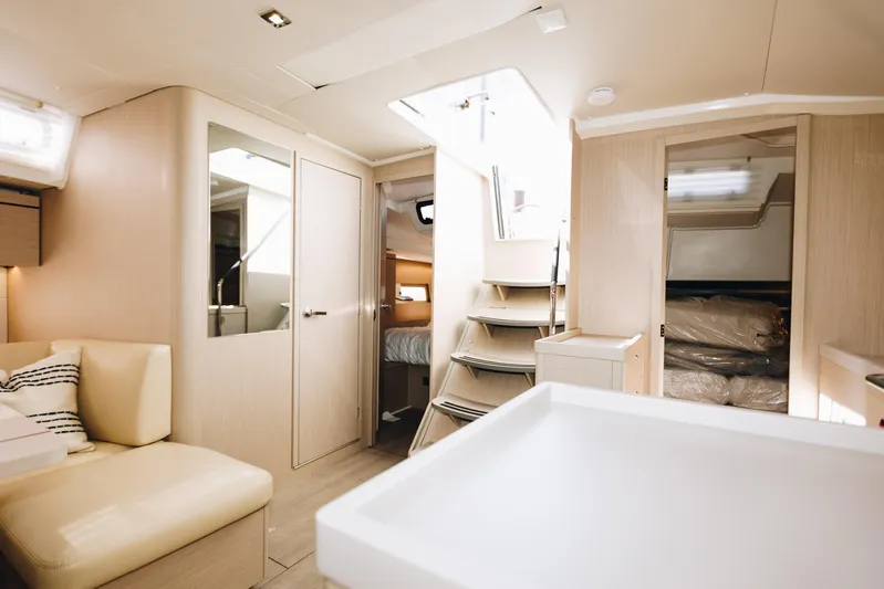  Yacht Photos Pics 2024 Beneteau Oceanis 46.1 interior with modern design and spacious layout.