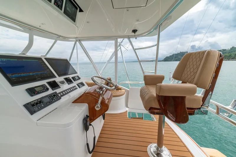 Annie Girl Yacht Photos Pics Helm of 1997 Custom Carolina 49 Ricky Gillikan yacht with modern controls and luxurious seating.