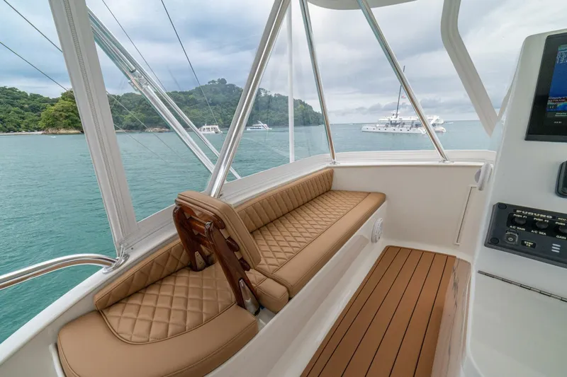 Annie Girl Yacht Photos Pics Luxurious interior of 1997 Custom Carolina 49 Ricky Gillikan yacht with scenic ocean view.