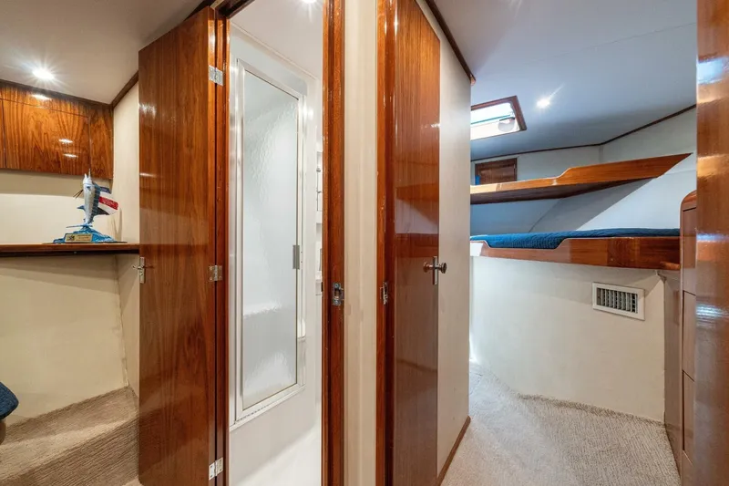 Annie Girl Yacht Photos Pics Interior of 1997 Custom Carolina 49 Ricky Gillikan yacht with wood finish and cozy cabin.