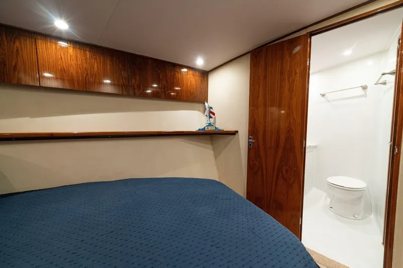 Annie Girl Yacht Photos Pics Luxurious cabin interior of 1997 Custom Carolina 49 Ricky Gillikan yacht with ensuite bathroom.