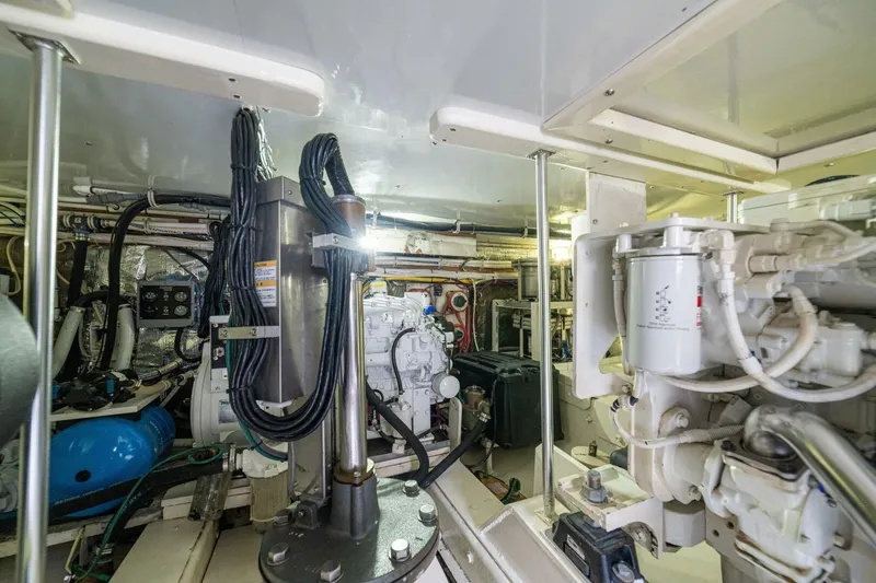 Annie Girl Yacht Photos Pics Engine room of 1997 Custom Carolina 49 Ricky Gillikan boat, showcasing machinery and equipment.