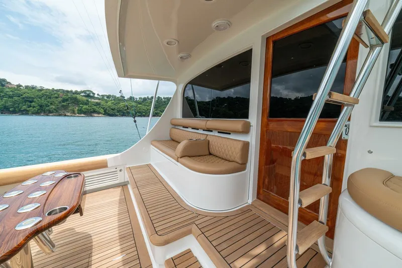 Annie Girl Yacht Photos Pics Luxurious 1997 Custom Carolina 49 Ricky Gillikan yacht interior with elegant seating and wooden accents.