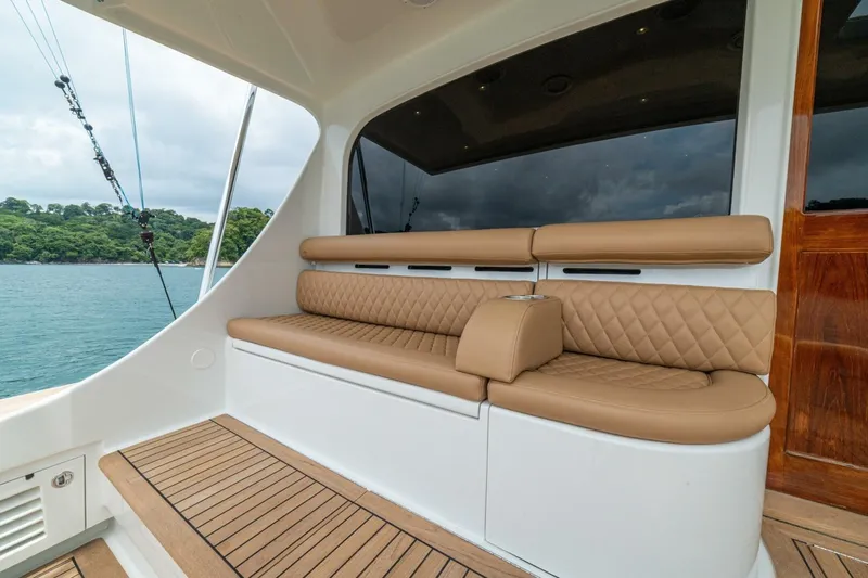 Annie Girl Yacht Photos Pics Luxurious seating on 1997 Custom Carolina 49 Ricky Gillikan yacht, with scenic ocean view.