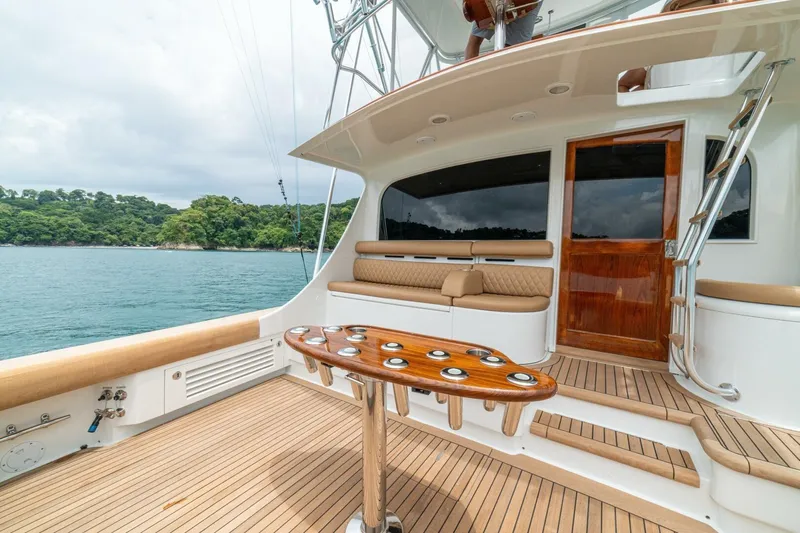 Annie Girl Yacht Photos Pics Luxurious 1997 Custom Carolina 49 Ricky Gillikan yacht with elegant teak deck and seating area.