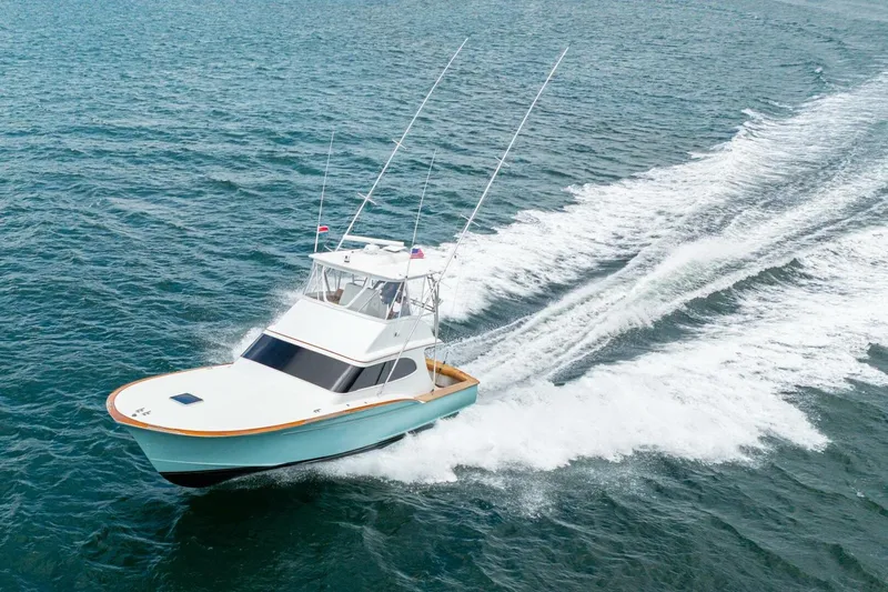 Annie Girl Yacht Photos Pics Custom Carolina 49 Ricky Gillikan 1997 yacht cruising on open water.