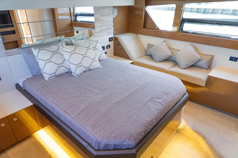 Duke Yacht Photos Pics Luxurious bedroom interior of 2018 Cruisers Yachts 50 Cantius with modern design and cozy bedding.