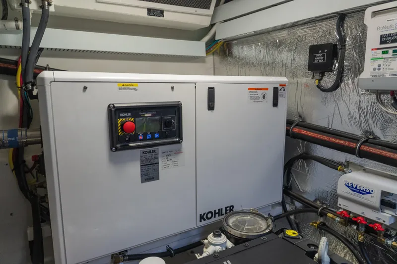 Duke Yacht Photos Pics Engine room of 2018 Cruisers Yachts 50 Cantius with Kohler generator.