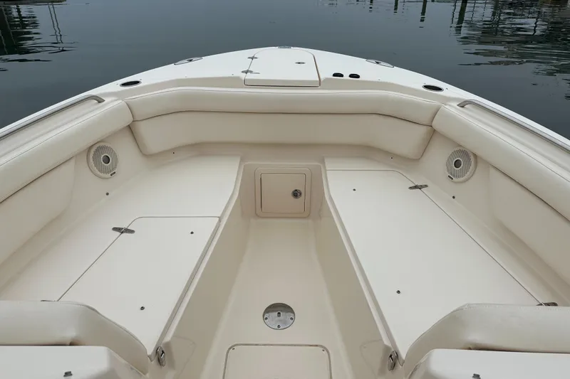  Yacht Photos Pics 2018 Grady-White Freedom 285 boat interior with spacious seating and storage compartments.