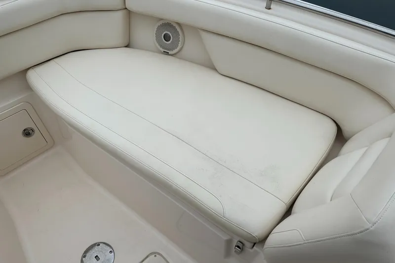  Yacht Photos Pics 2018 Grady-White Freedom 285 boat interior with white cushioned seating.