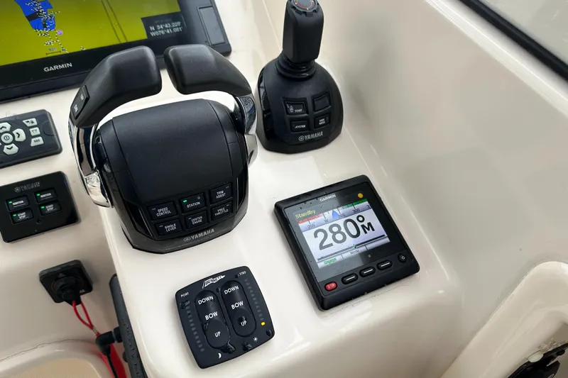  Yacht Photos Pics Control panel of 2018 Grady-White Freedom 285 boat with Garmin electronics.